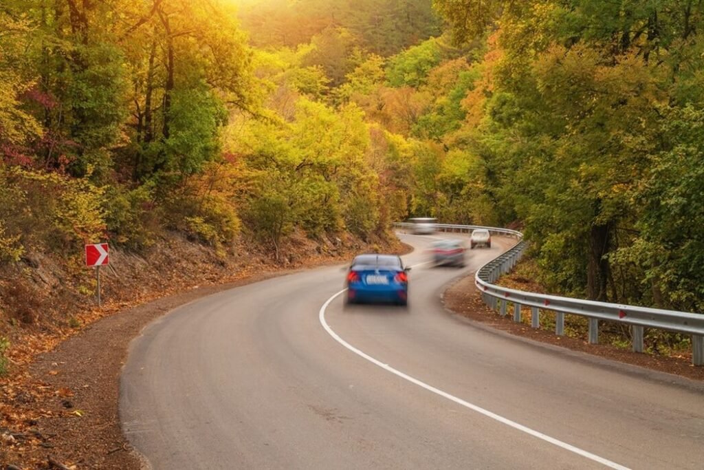 car-on-autumn-road-2025-02-22-19-01-42-utc.jpg