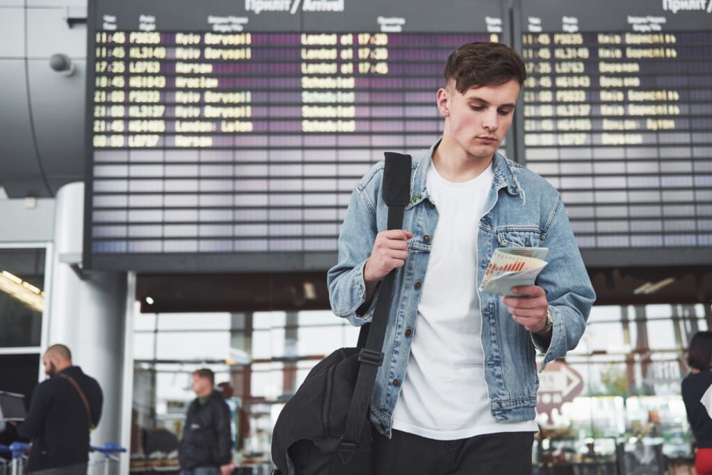 The Man Expects His Flight at the Airport